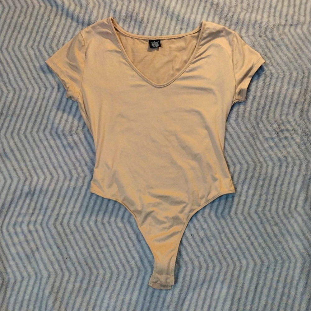 One piece w no tag..small polyester and spandex one piece very soft